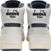6d3f5cead63071d8e7fc9054d3ec359f DIADORA Mi Basket Used White/Blue Corsair