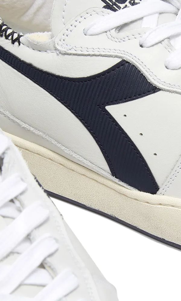 f81e43d3b66a2debc5ea4344c04387d3 DIADORA Mi Basket Row Cut White/Blue Corsair